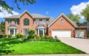 A brick home in the suburbs of Chicago with grubs on my Arlington property.